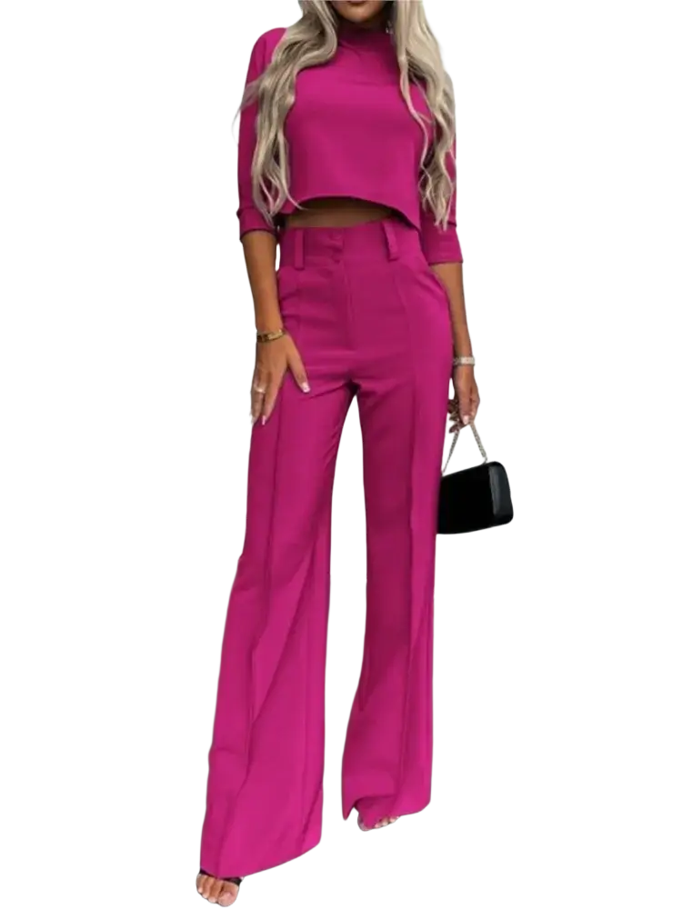 Fuchsia two-piece office suit with a cropped top and wide-leg pants made from soft fabric for professional wear