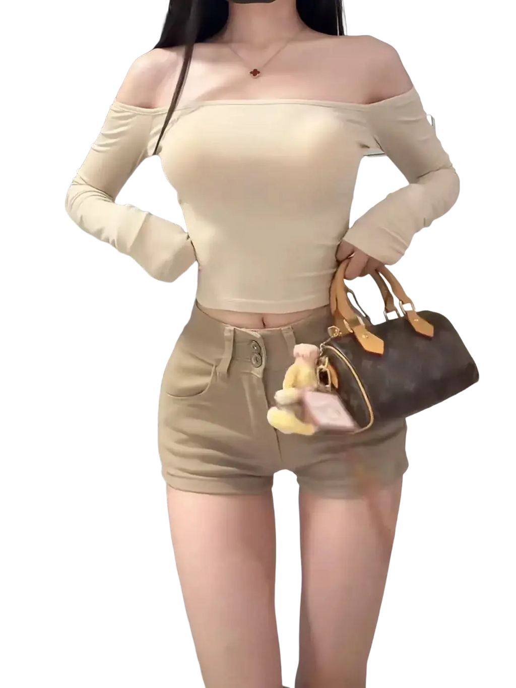 Beige long sleeve off-the-shoulder crop top with ribbed texture from two-piece set paired with high-waisted shorts
