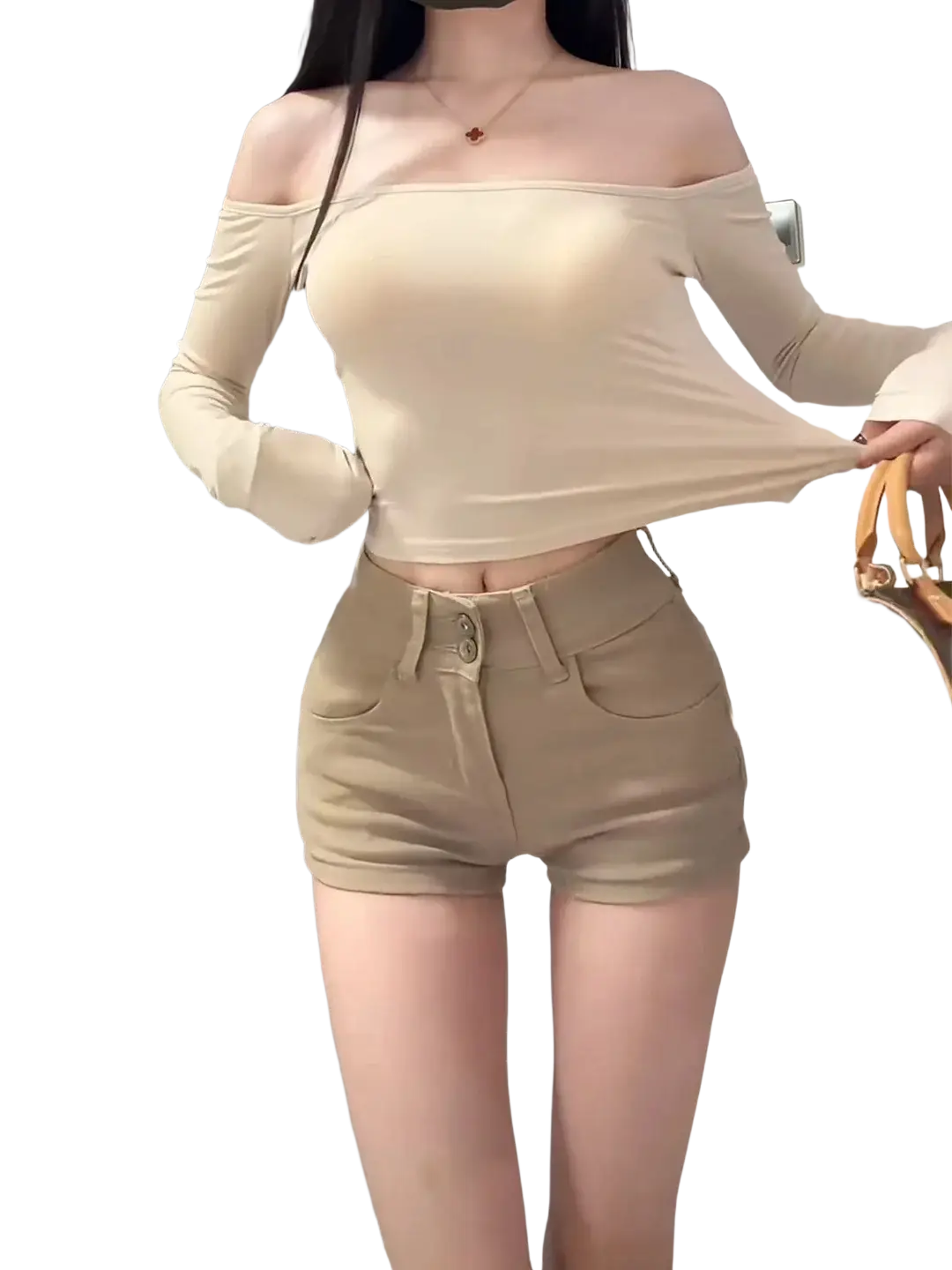 Beige two-piece set featuring a fitted stretchy off-the-shoulder long sleeve top with high-waisted shorts