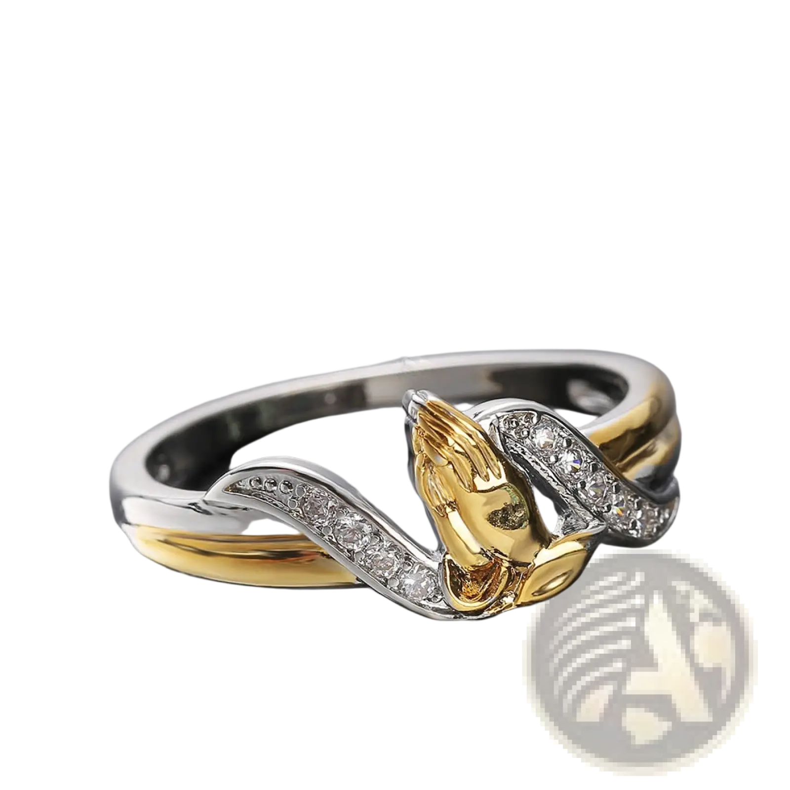 Two tone 18k gold and silver ring with a central praying hands design adorned with clear cubic zirconia stones