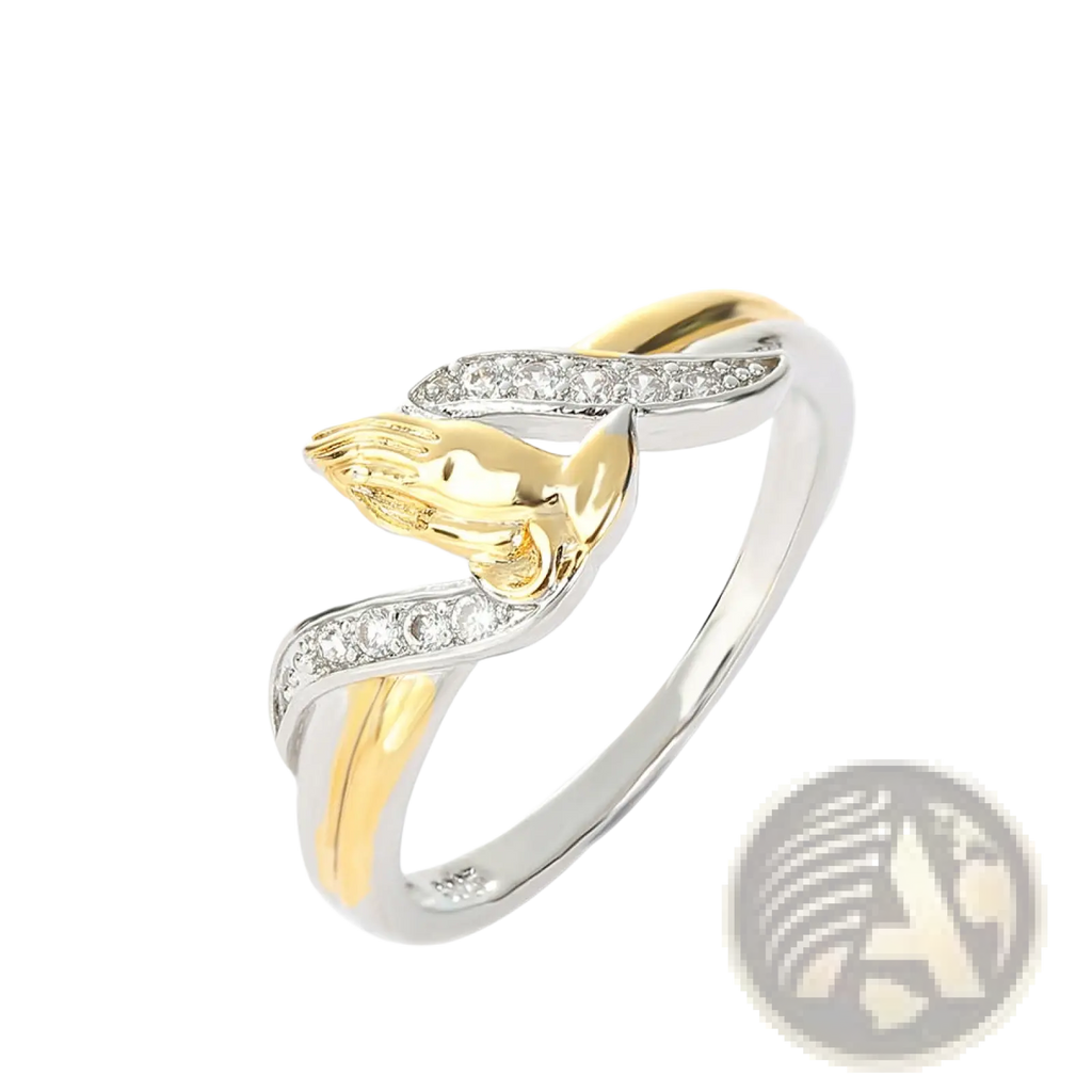 Two tone 18k gold and silver ring with praying hands design and clear cubic zirconia stones on the band