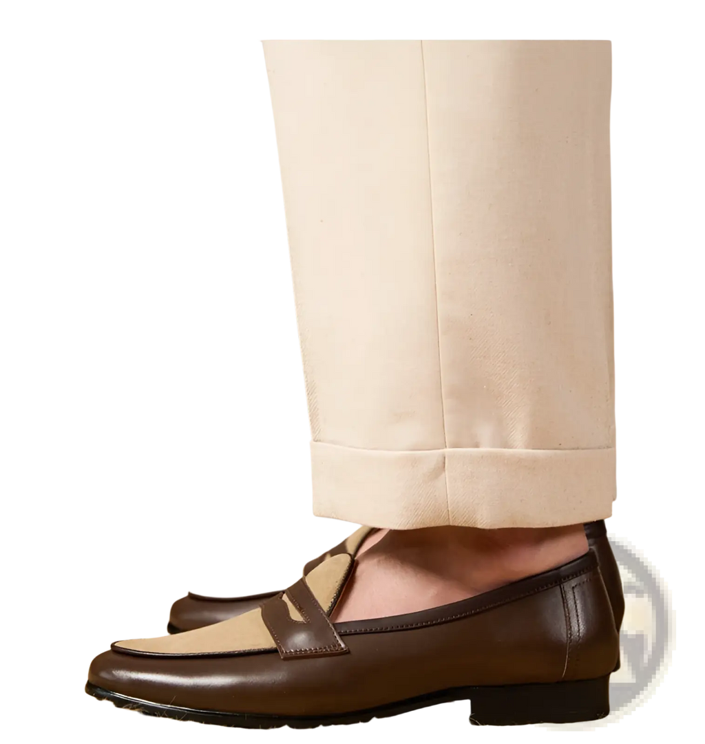 Two tone British style suede loafers in brown leather with tan suede toe cap and classic moccasin-style seam