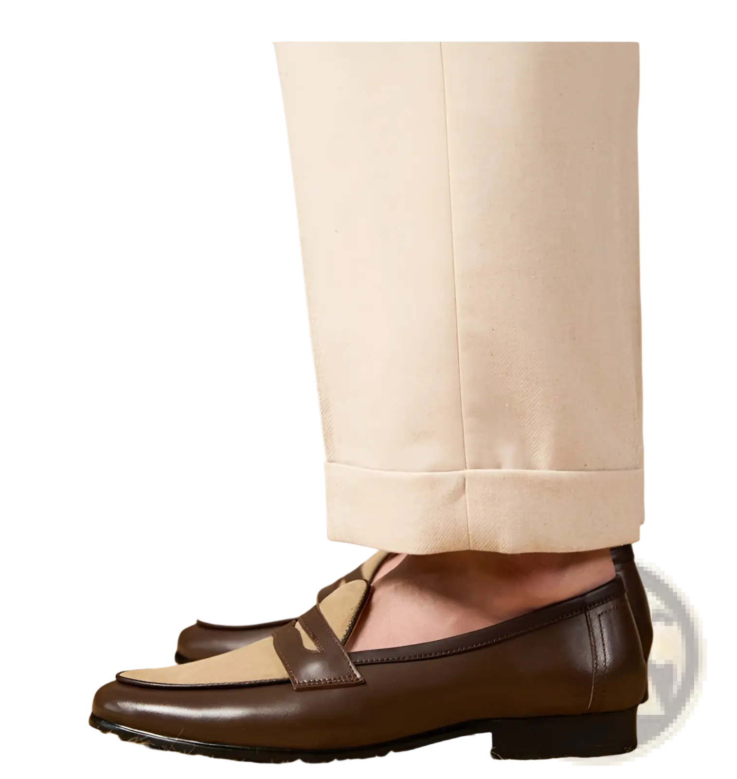 Two tone British style suede loafers in brown leather with tan suede toe cap and classic moccasin-style seam