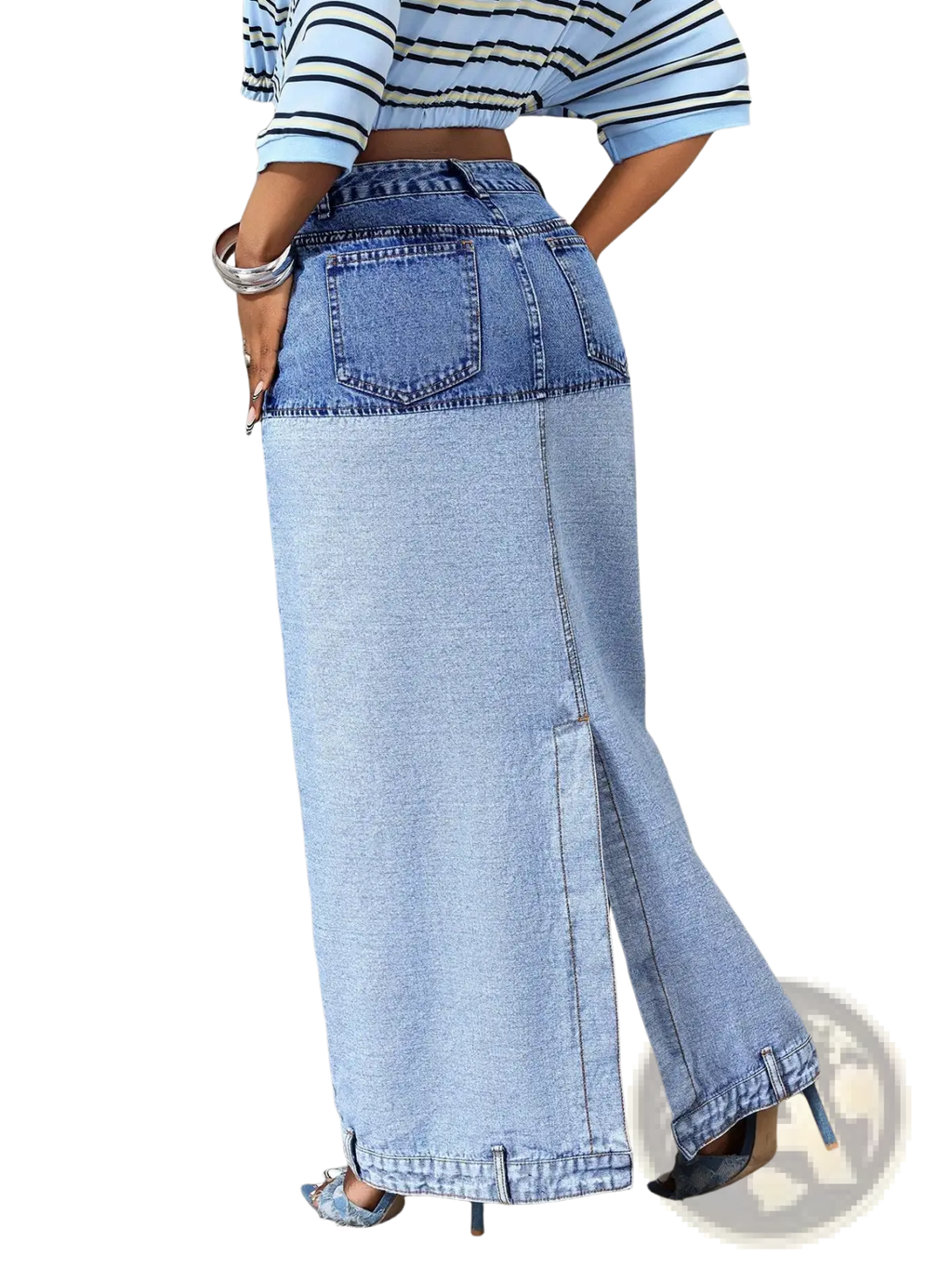 Two tone denim maxi skirt with darker blue waistband lighter blue lower front slit and classic back pockets shown from back side