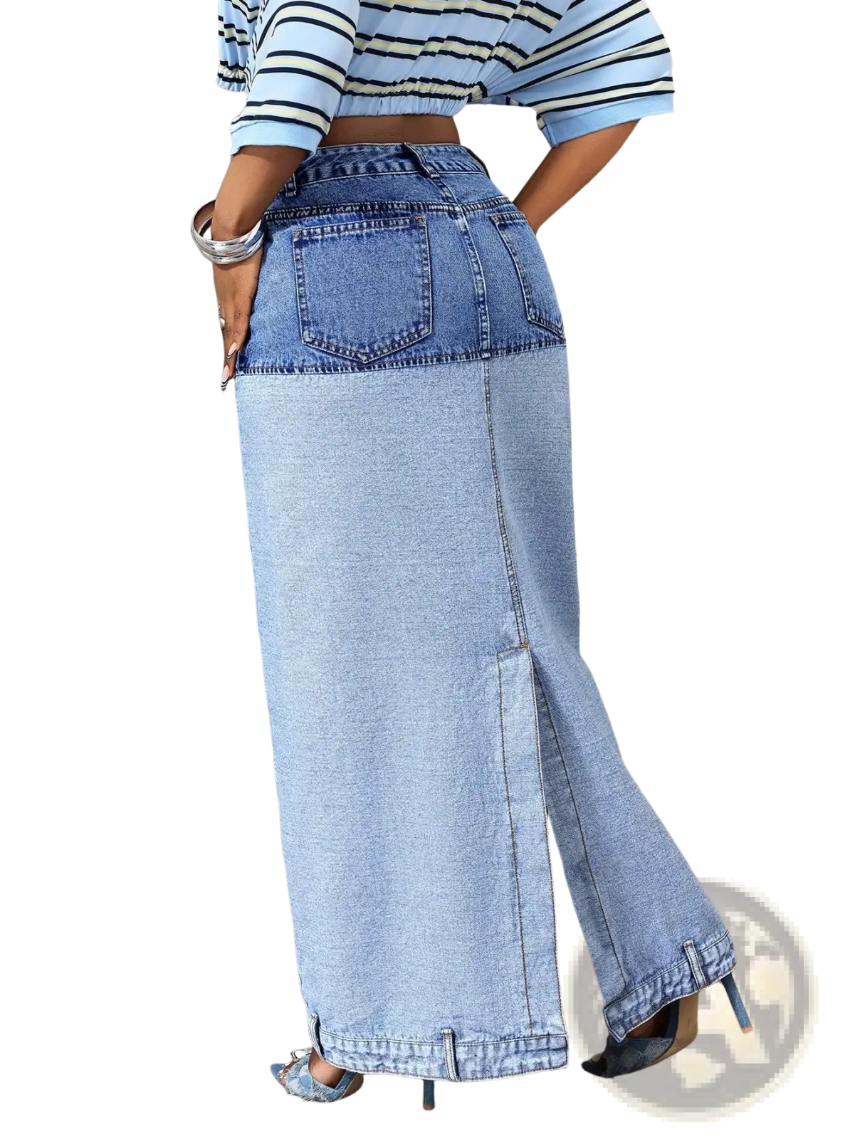 Two tone denim maxi skirt with darker blue waistband lighter blue lower front slit and classic back pockets shown from back side
