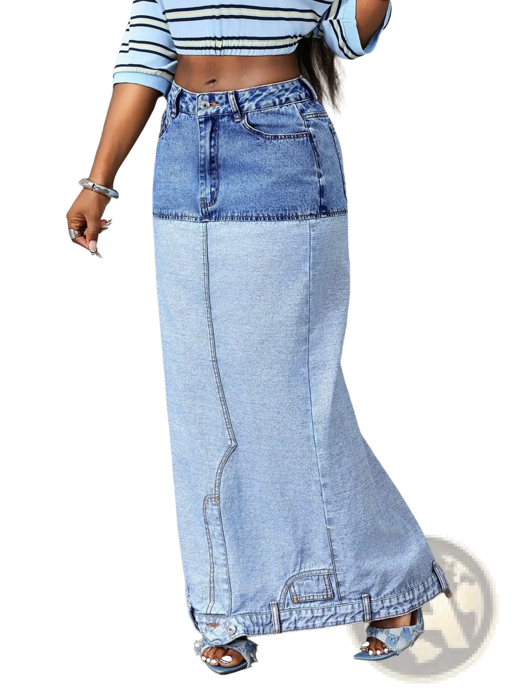 A high-waisted two tone denim maxi skirt in darker blue and lighter wash denim with a color block design