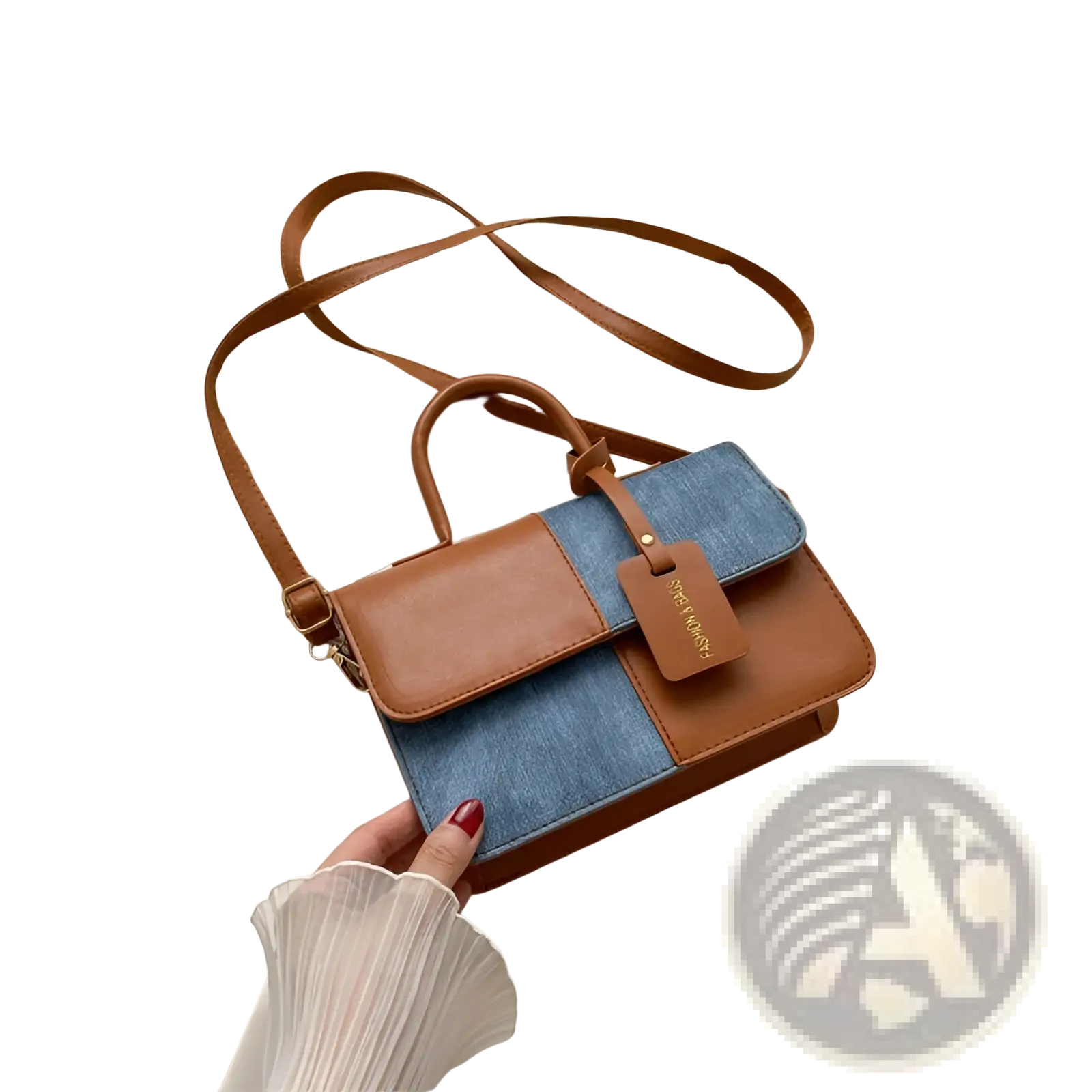 A two tone denim patchwork crossbody bag with tan leather flap blue denim panel and matching brown straps