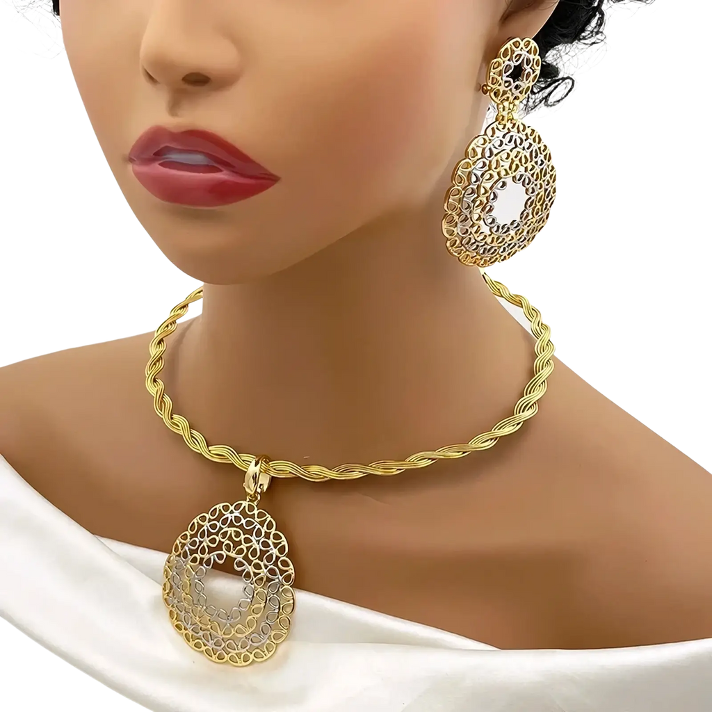 Two tone gold filigree jewelry set for women featuring a gold toned pendant necklace with twisted rope chain and matching earrings