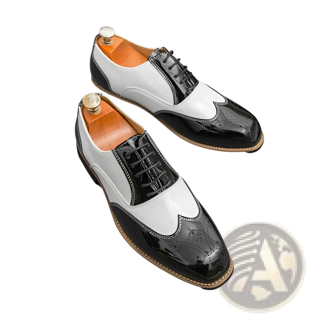 Two-tone men’s brogue oxford shoes in black and white with glossy patent leather accents for formal wear