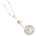 Two-tone silver and gold sunflower cross pendant necklace with a delicate chain and ornate rose design accented by stones