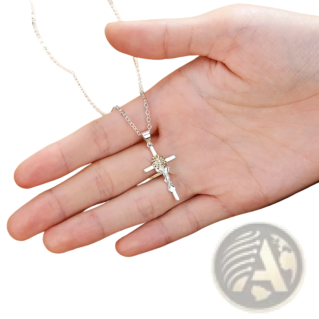Silver crucifix pendant with detailed figure of christ on the cross suspended from a delicate chain in a two-tone sunflower cross necklace