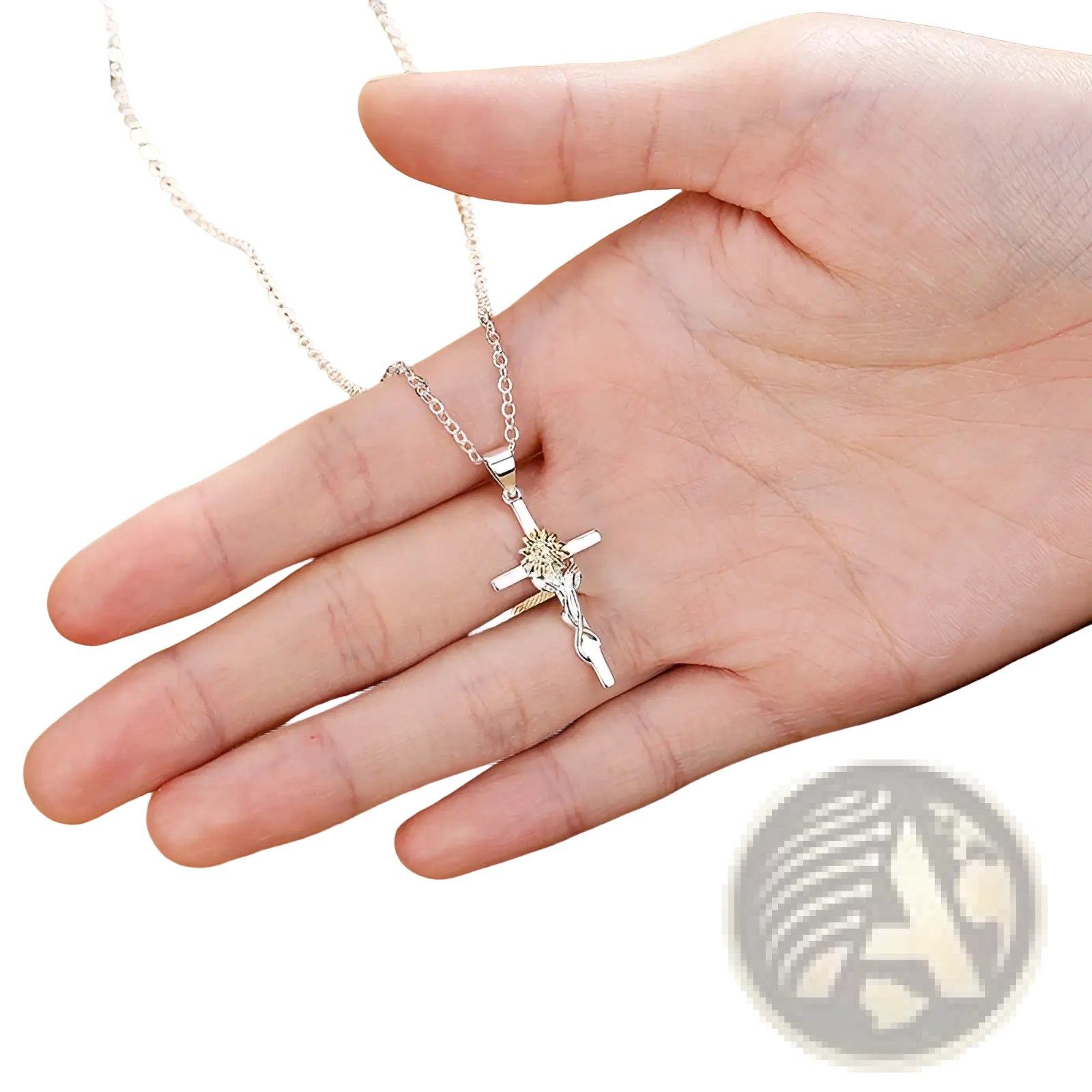 Silver crucifix pendant with detailed figure of christ on the cross suspended from a delicate chain in a two-tone sunflower cross necklace