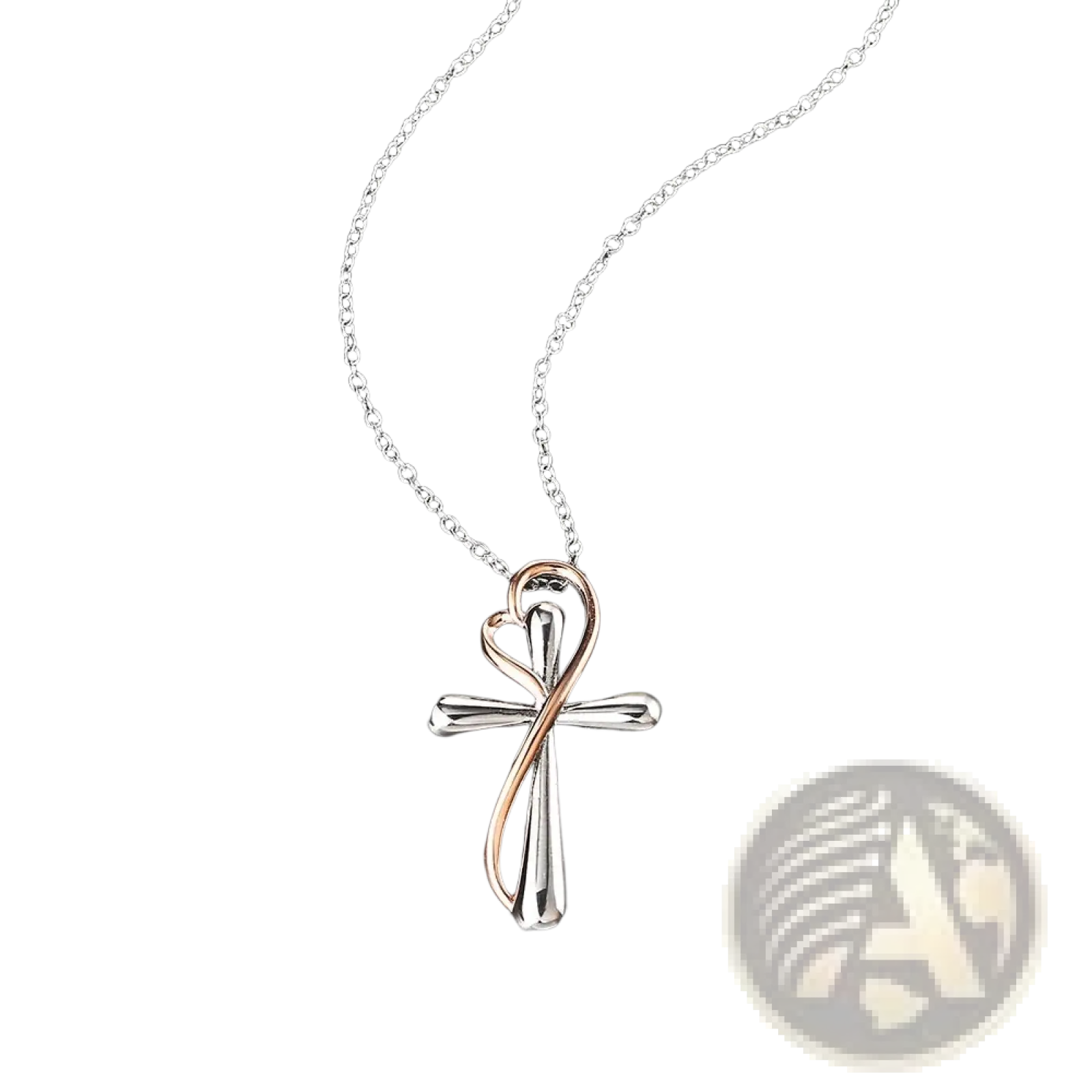 Two tone silver and rose gold cross pendant with heart shaped design hanging from delicate chain in necklace