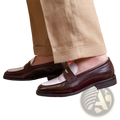 Two tone square toe leather loafers featuring brown leather with a contrasting white panel and stitched detailing