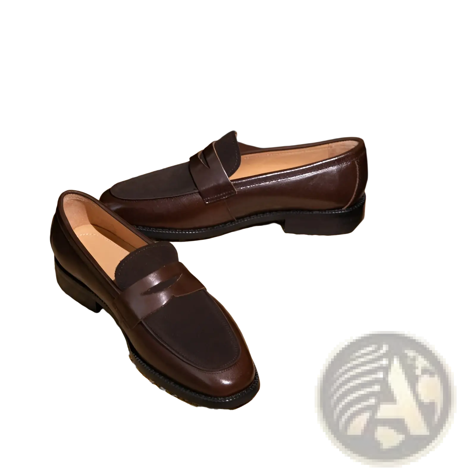 Brown two tone leather loafers with a classic slip-on design and single strap across the toe in square toe style