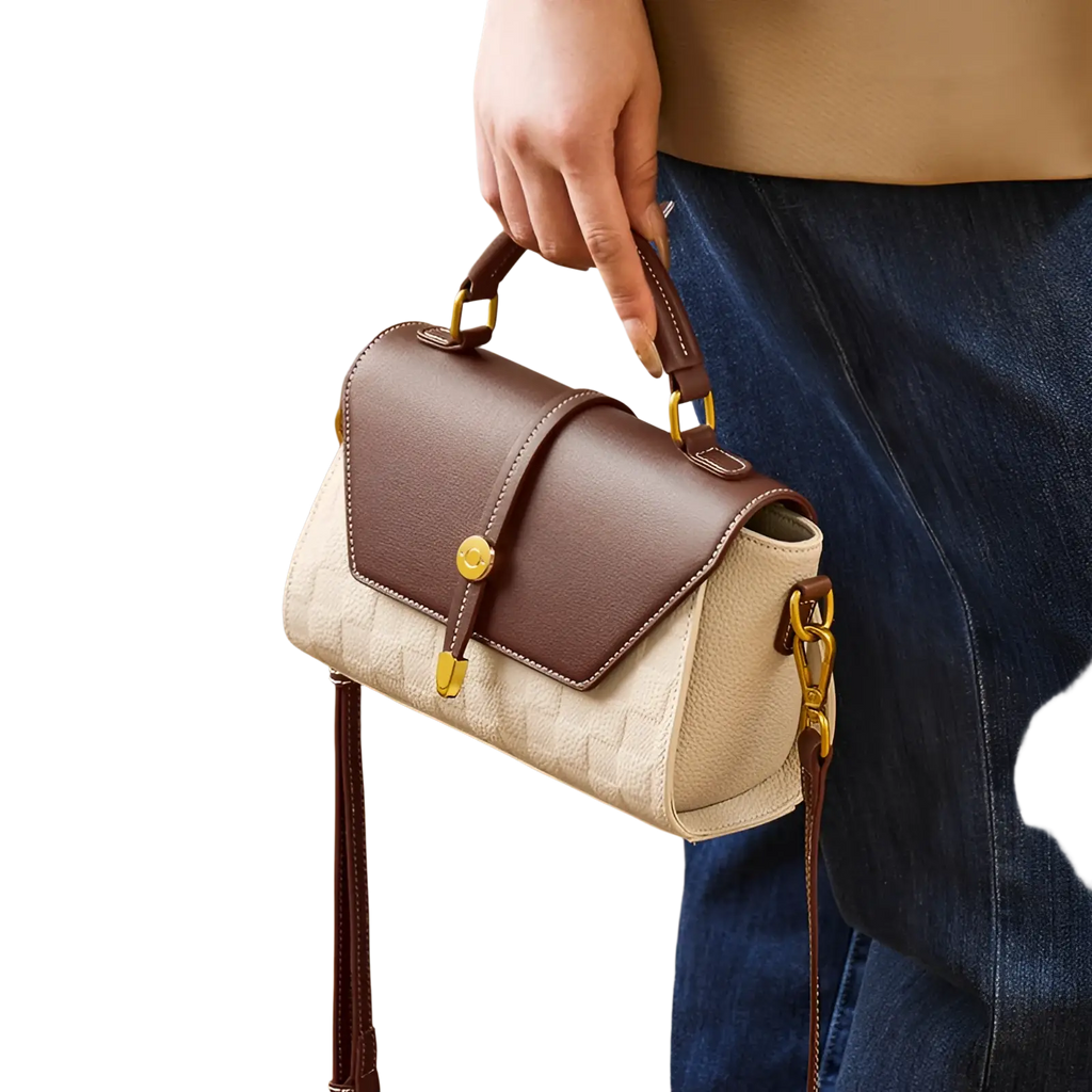 Two-tone brown and cream leather woven crossbody handbag with gold hardware for stylish everyday use