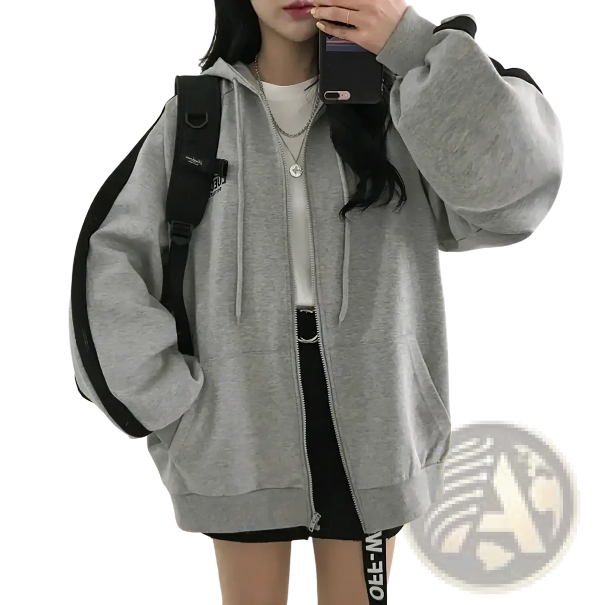 Two tone zip up oversized hoodie in gray with black contrast panels and a white logo on the sleeve