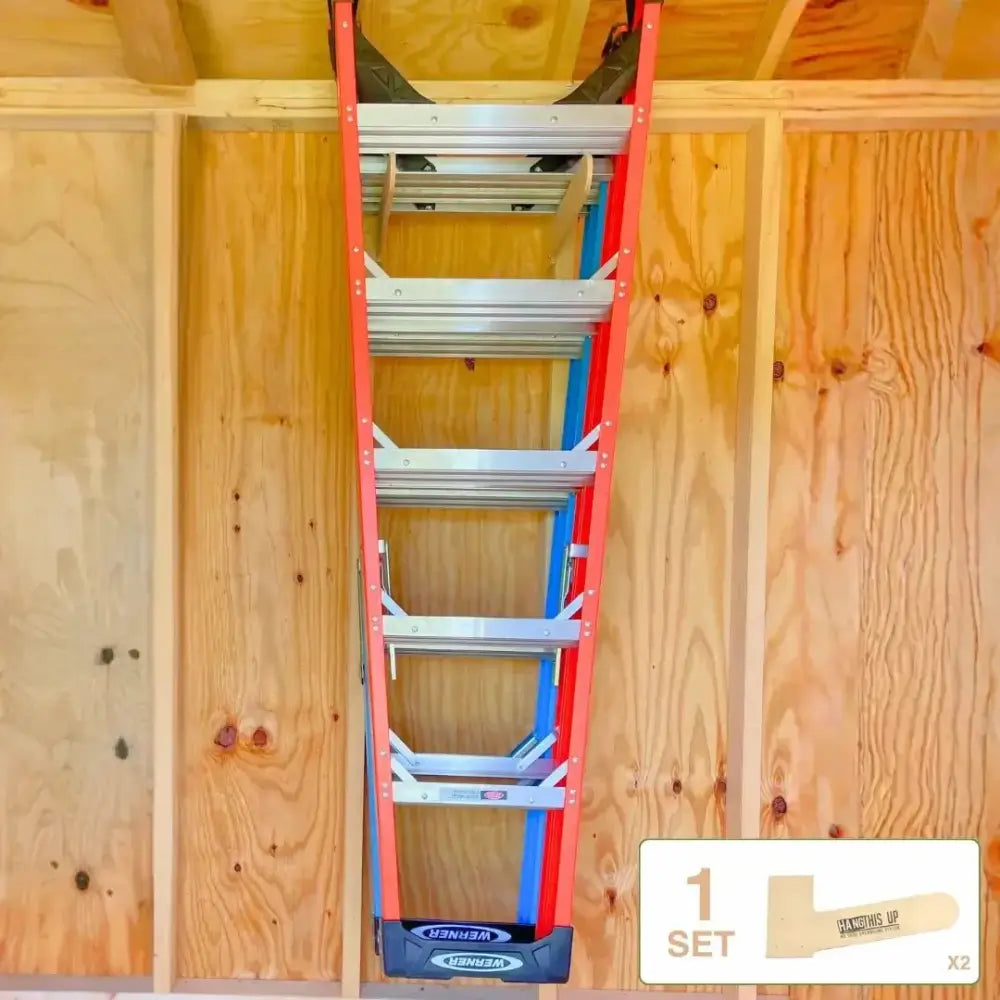 Red and blue werner ladder with silver rungs hanging vertically on wooden walls in ultimate garden tool wall organizer kit