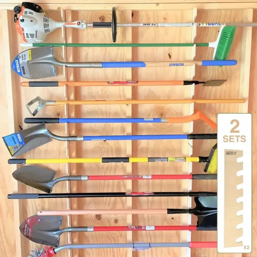 Ultimate garden tool wall organizer with colorful shovels, green broom, and orange string trimmer on wooden rack