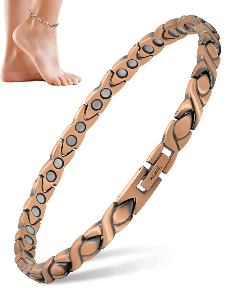 Rose gold pure copper magnetic therapy anklet for women with interlocking leaf-shaped links and embedded circular magnets