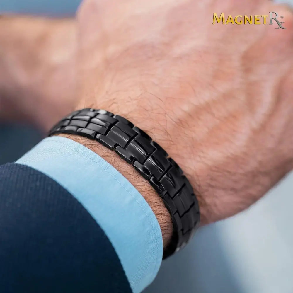Black magnetic bracelet with sleek interlocking neodymium links designed for ultra strength magnetic therapy use