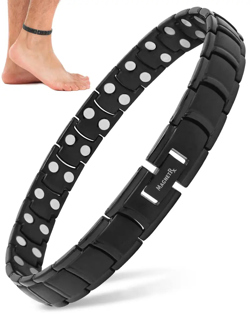 Men’s black titanium magnetic therapy anklet featuring silver circular magnets in a sleek segmented design with magnetr logo