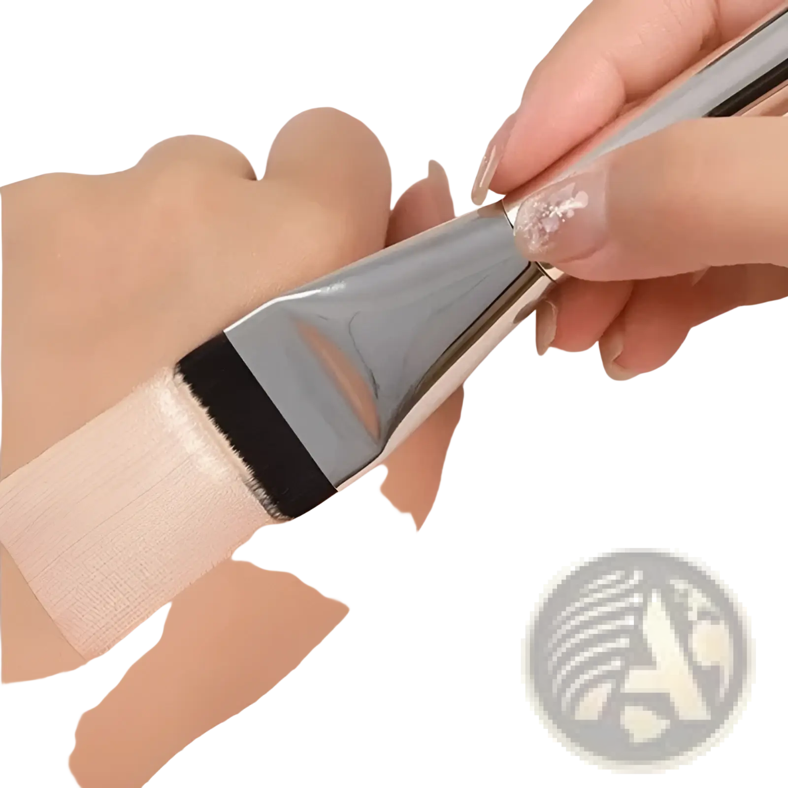 Ultra thin foundation brush with a silver toned metallic handle and dense black bristles for precise application