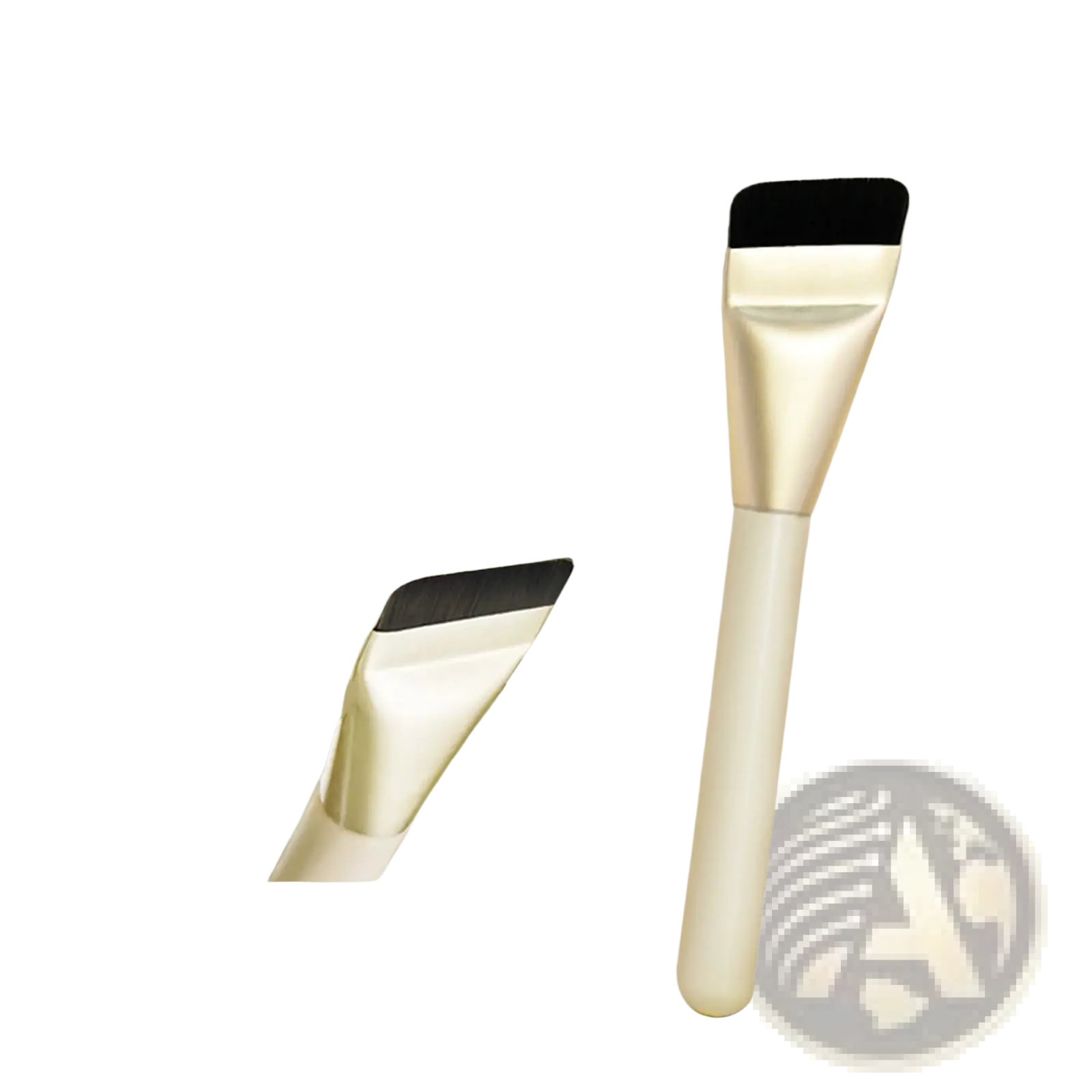 A sleek cream-colored ultra thin foundation brush with a black silicone head and smooth tapered handle for traceless makeup application