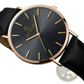 Ultra thin minimalist black leather men watch with rose gold-tone case and black dial with golden hour markers