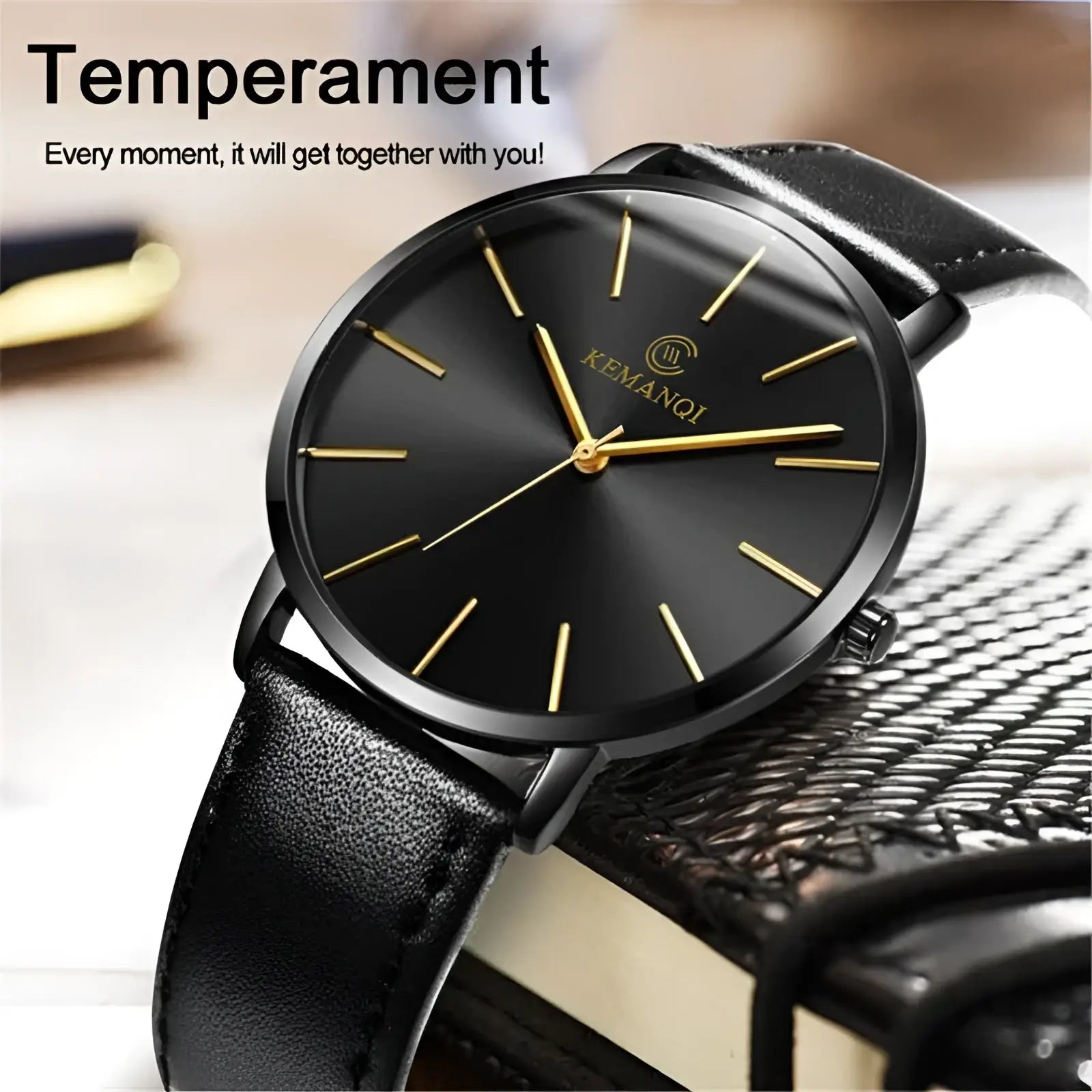 Ultra thin minimalist black leather men watch with sleek black dial gold tone hands and markers featuring kemanqi logo