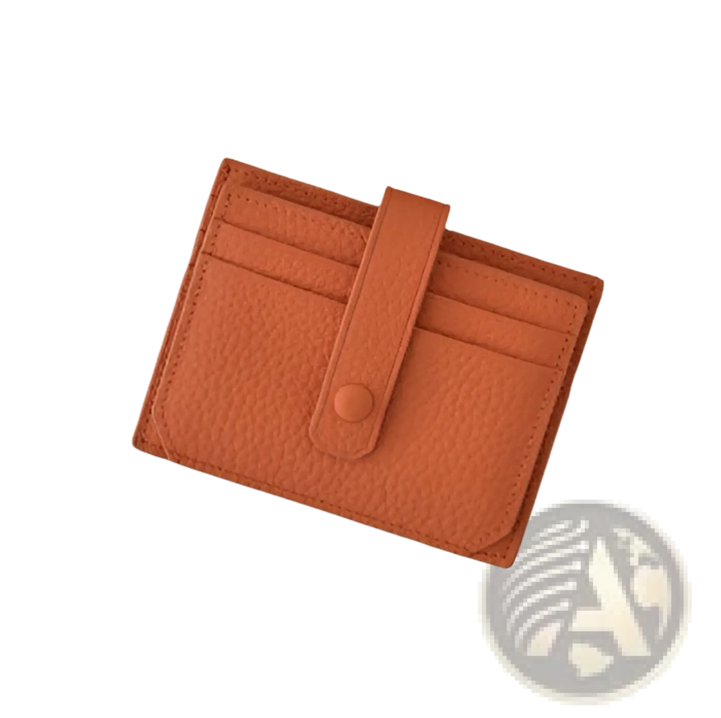 Orange textured leather ultra thin minimalist card holder with flap button closure and strap, front view