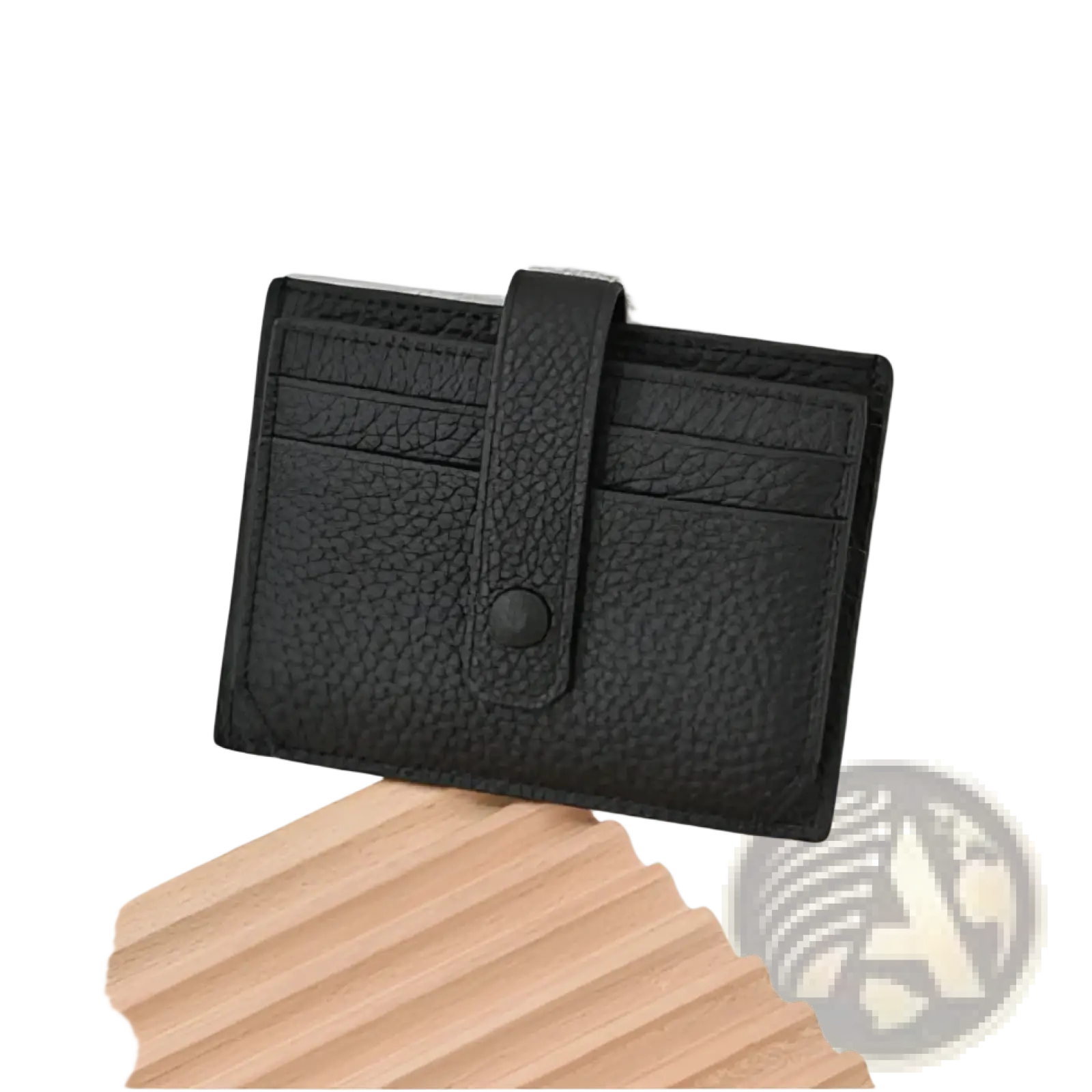 Black textured leather ultra thin minimalist card holder with a flap closure secured by a single button and strap
