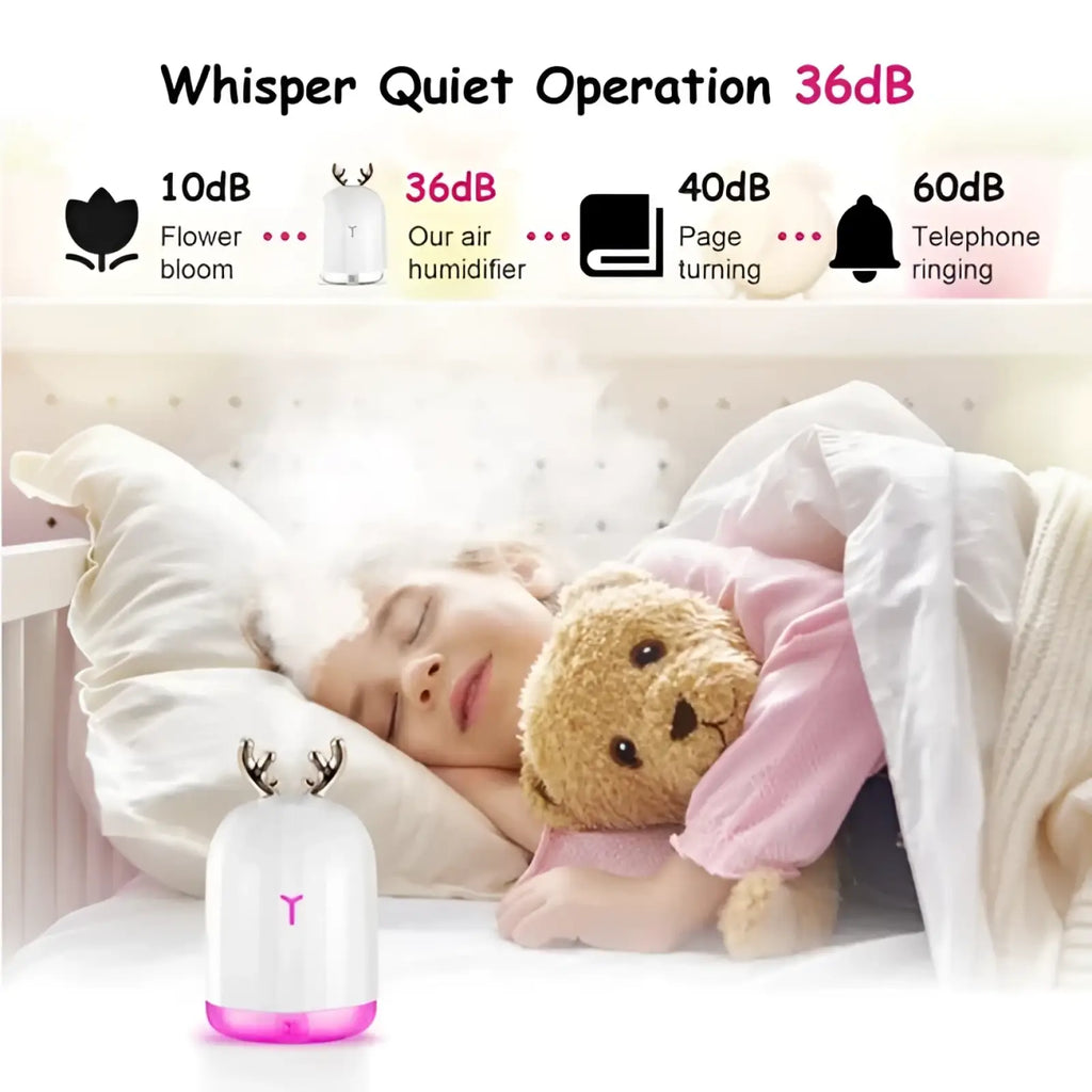 Ultrasonic deer air humidifier in white and pink with a glowing base for improved indoor air quality