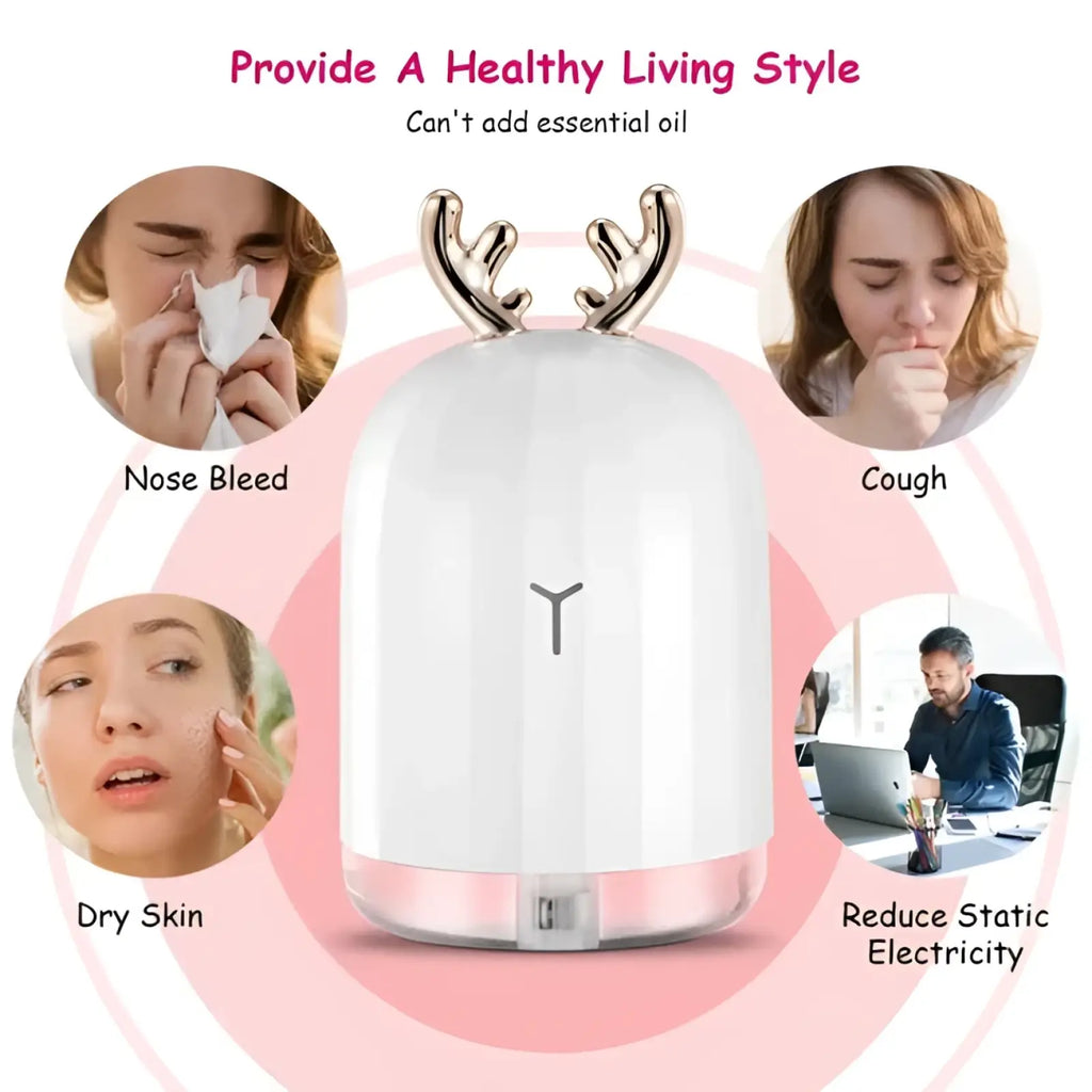 White ceramic ultrasonic deer air humidifier with silver antler horns and minimalist y logo on glowing base