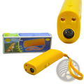 Bright yellow plastic ultrasonic dog trainer with two orange led lights and black lens for barking deterrent