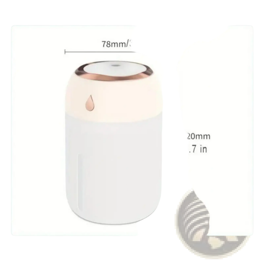 A sleek cylindrical white and rose gold ultrasonic USB desktop humidifier with night light and minimalist design