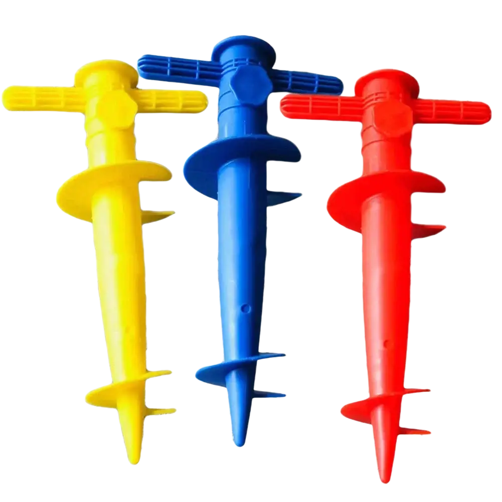 Three brightly colored plastic spiral garden stakes with cross handles for umbrella base use on sand ground and sun beach