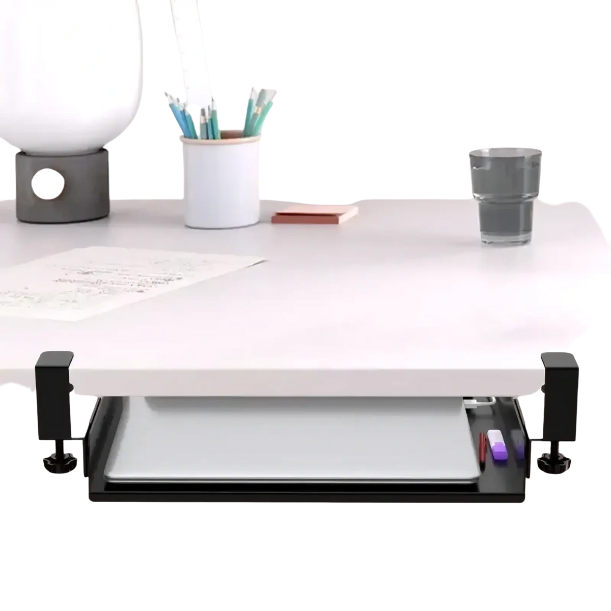 Black under desk laptop tray with adjustable clamps and sleek minimalist design for notebook storage and cable management
