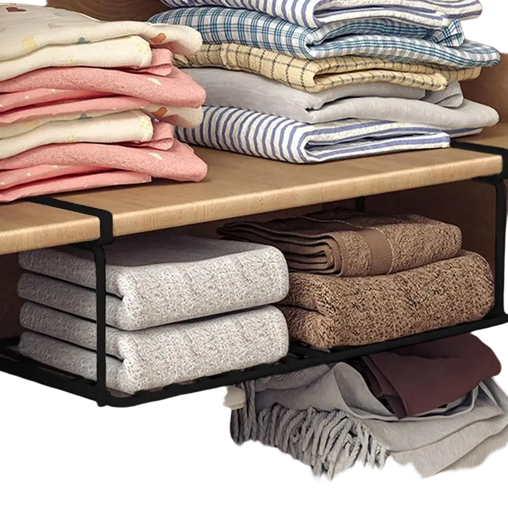 Black metal under shelf shoe storage basket organizer holding neatly folded towels and linens for efficient storage