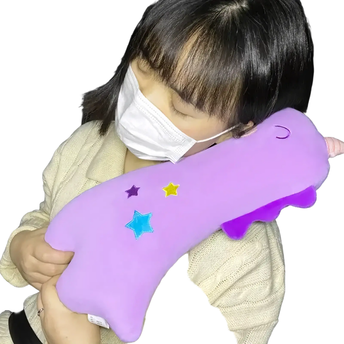 Purple plush unicorn-shaped neck pillow with embroidered stars and pink horn designed as a car seat belt pillow for kids