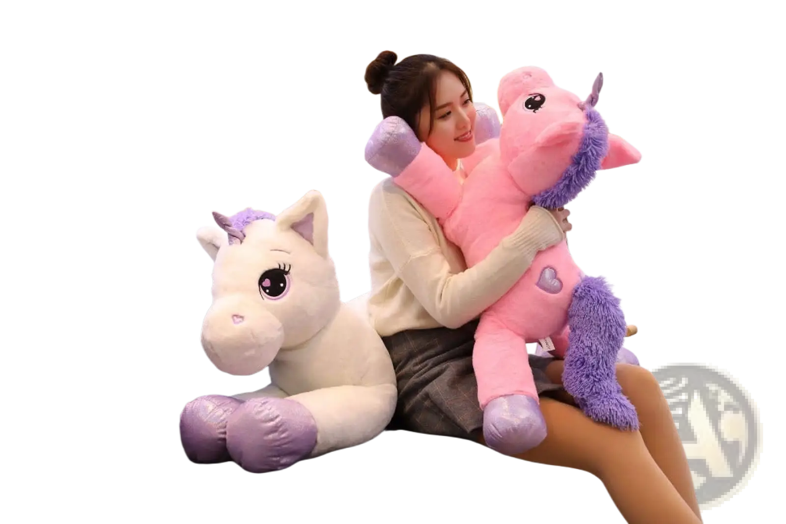Pink and purple unicorn plush toy with soft fluffy texture made of plush material for cuddly comfort