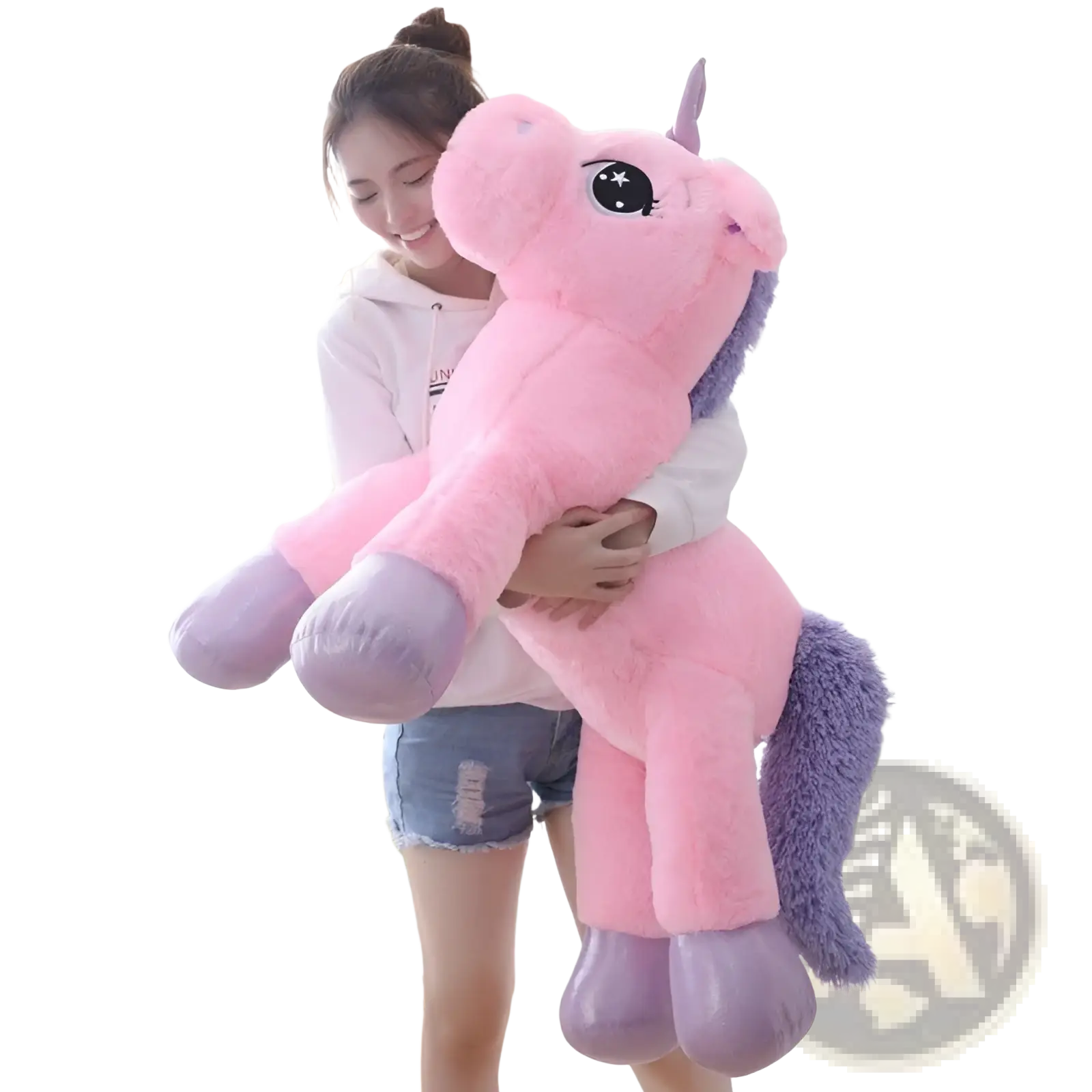 A plush pink unicorn toy with purple hooves mane and tail soft stuffed animal for cuddling and play