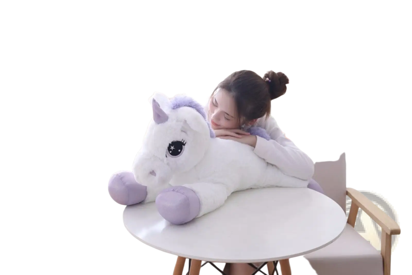A plush white unicorn stuffed animal with lavender accents and black starry eyes made of soft fabric material
