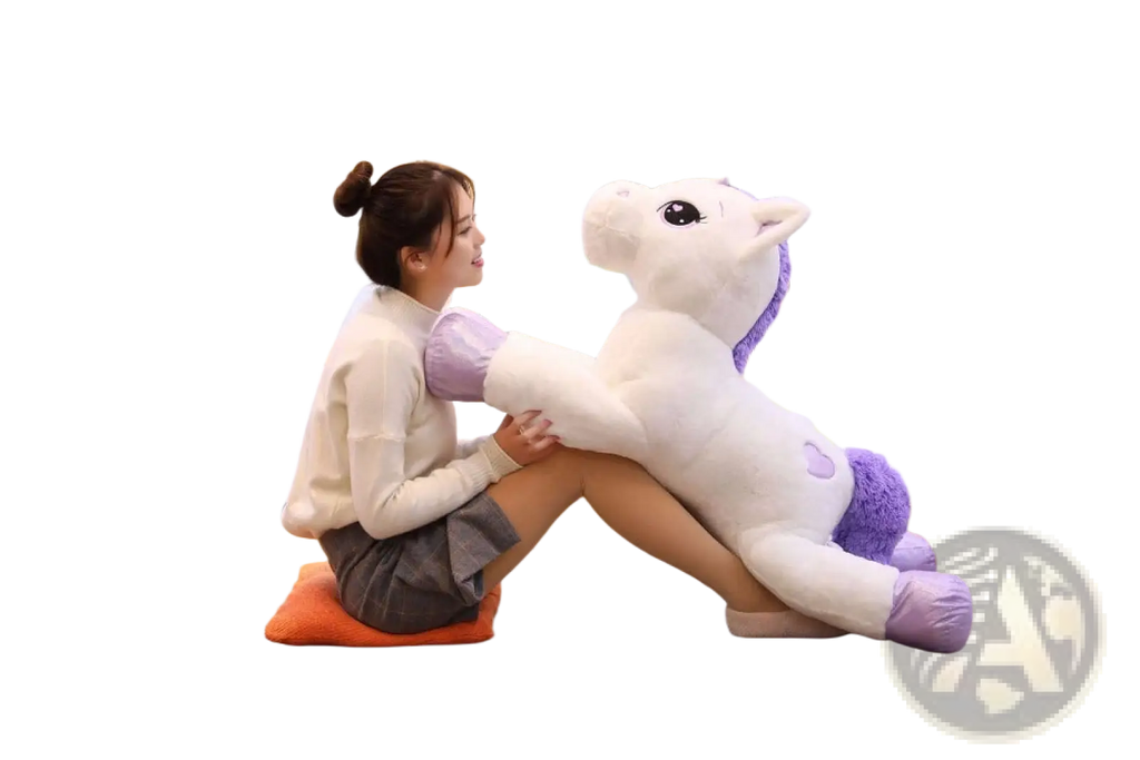 A soft plush unicorn toy with a white body, purple mane tail and hoof accents in pink and purple colors