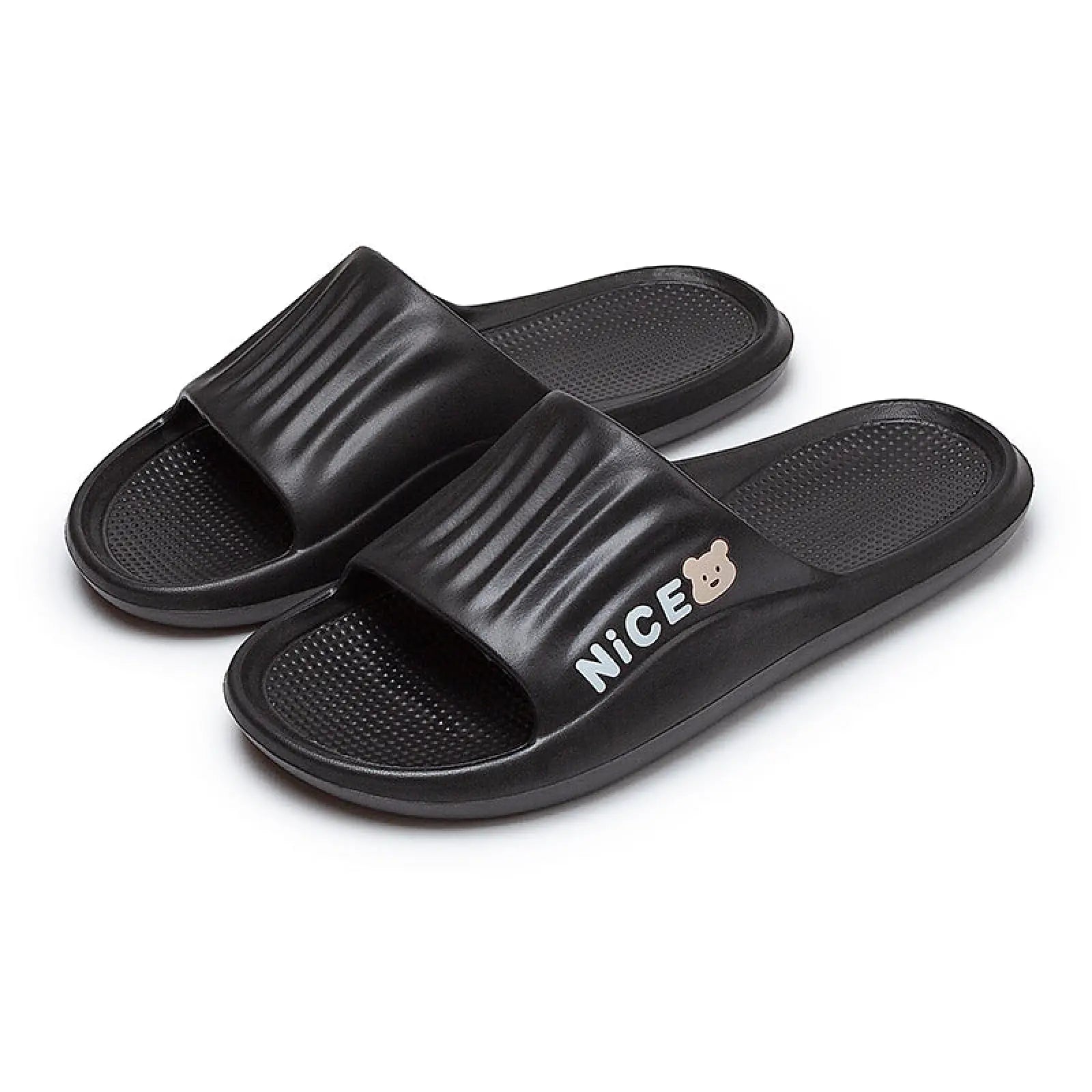Black unisex lightweight anti slip EVA shower slides with ribbed strap featuring nice text and small bear logo
