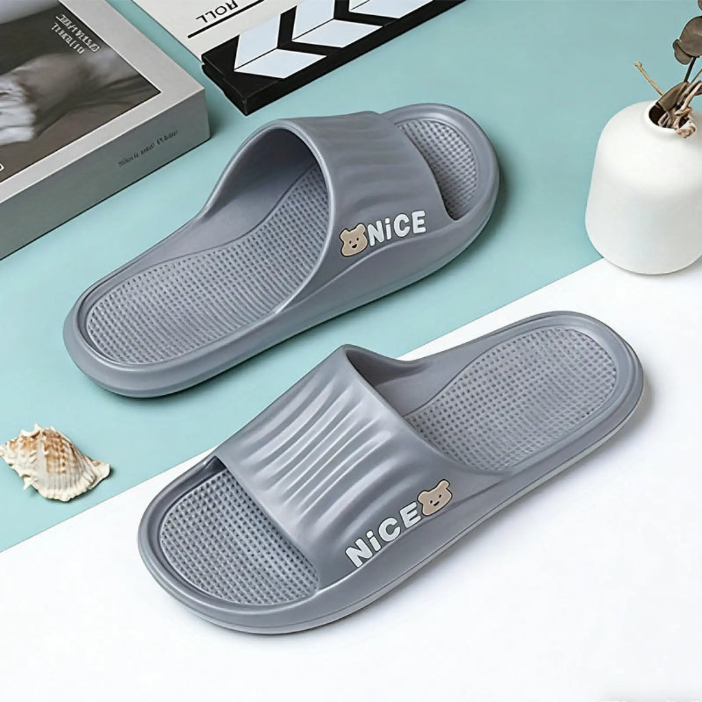 Gray unisex lightweight anti slip eva shower slides with textured sole nice print and small bear graphic