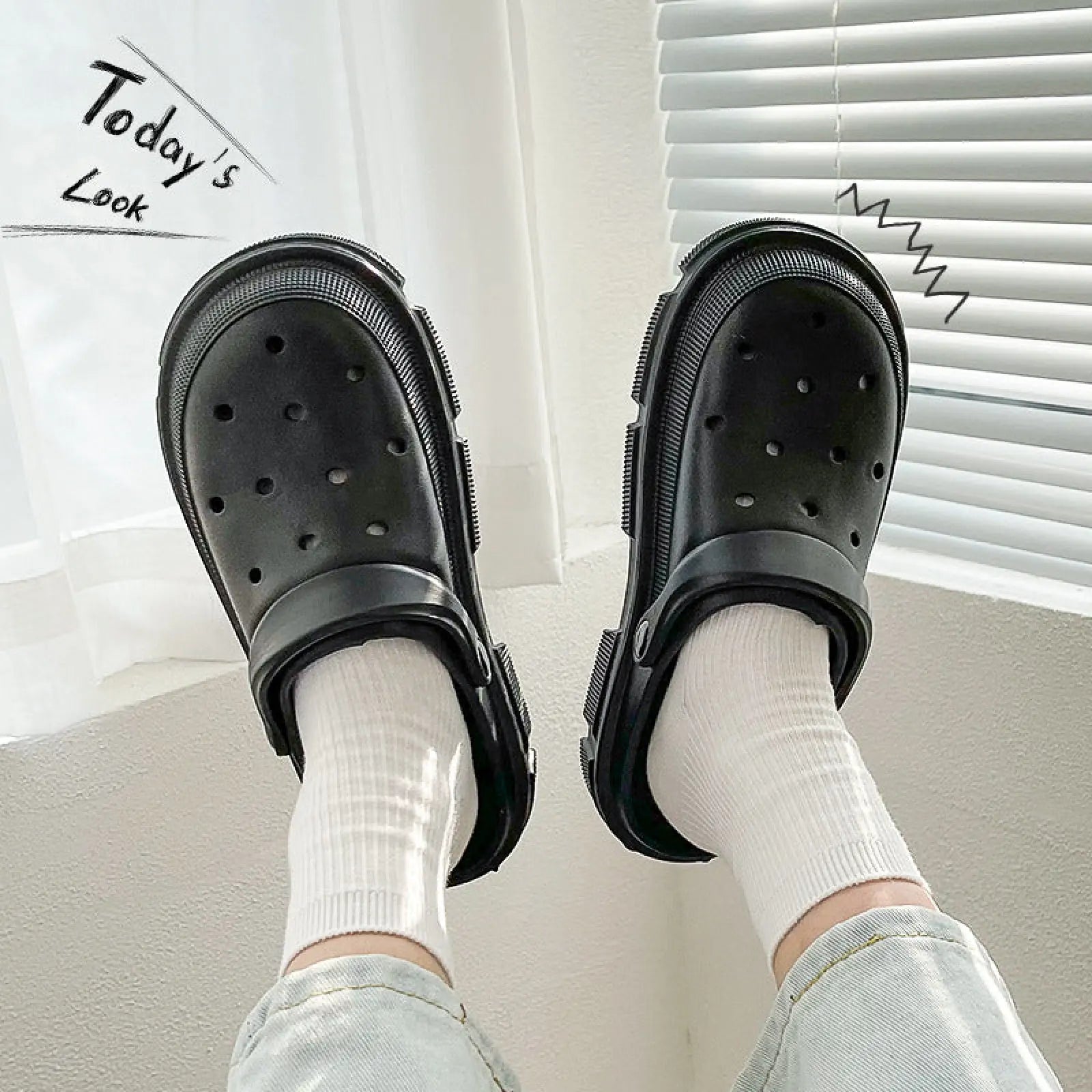 Black rubber unisex lightweight eva garden clogs and beach slippers with thick textured sole and ventilation holes