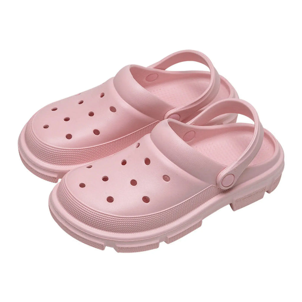 Pink unisex lightweight EVA garden clogs and beach slippers with textured sole and perforated upper