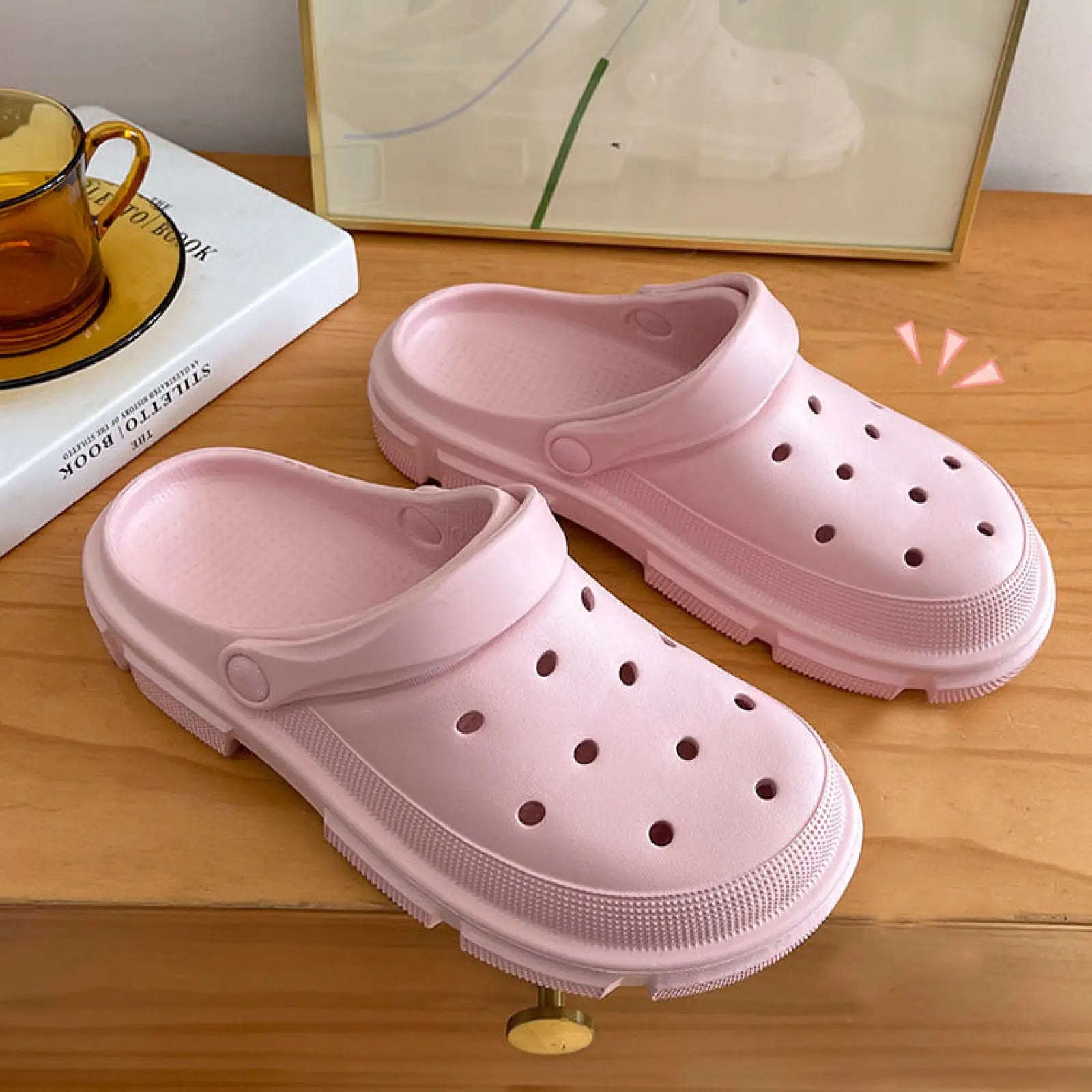 Pink rubber unisex lightweight eva garden clogs and beach slippers with thick textured sole and circular perforations