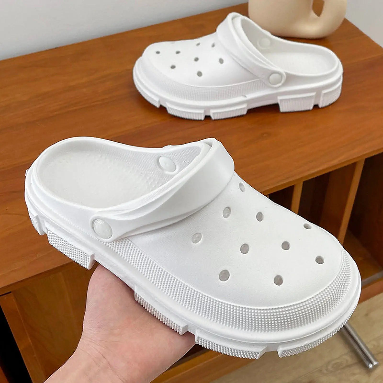 White unisex lightweight eva garden clogs with chunky sole and perforated upper for beach and casual wear